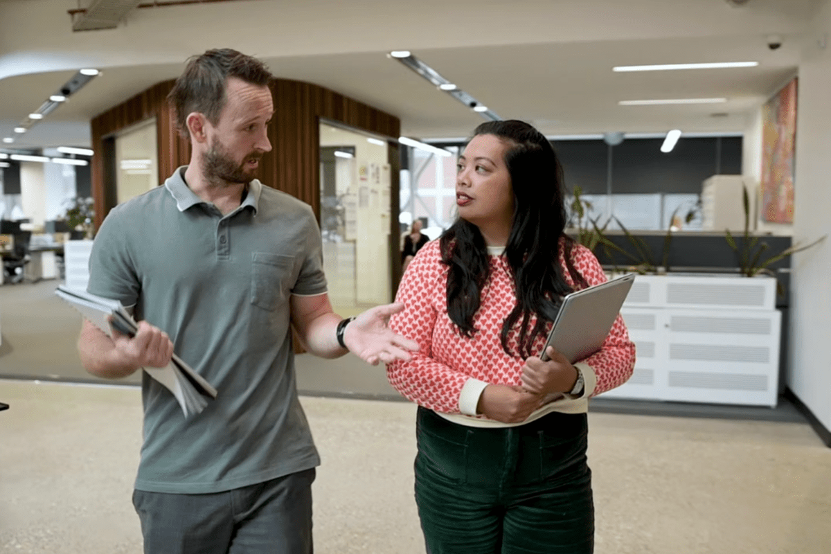 Two Barwon Water employees working and having a conversation