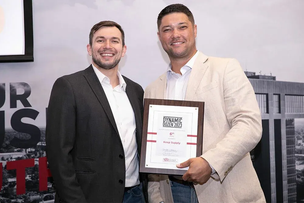 Robbie Mueller accepting the 2023 Springfield Business Journal's Dynamic Dozen award for 2023.