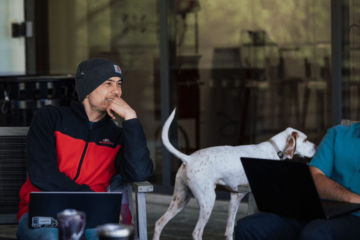 Man smiling with dog