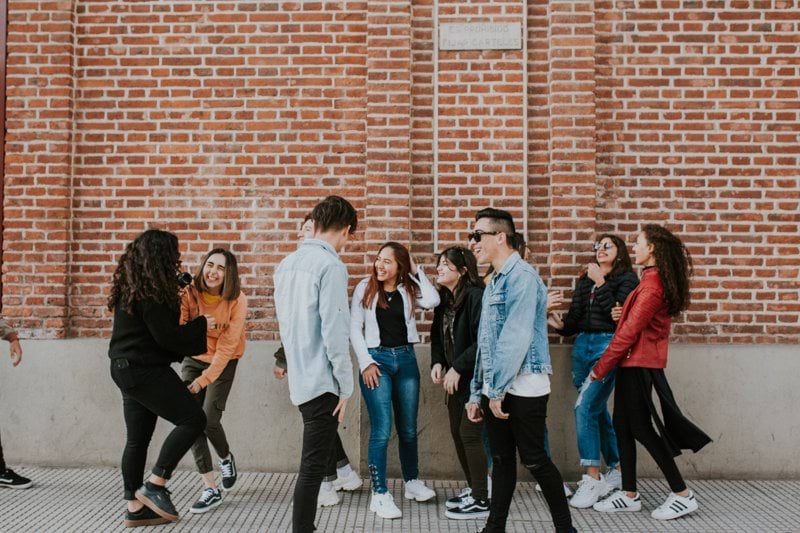 people standing near building
