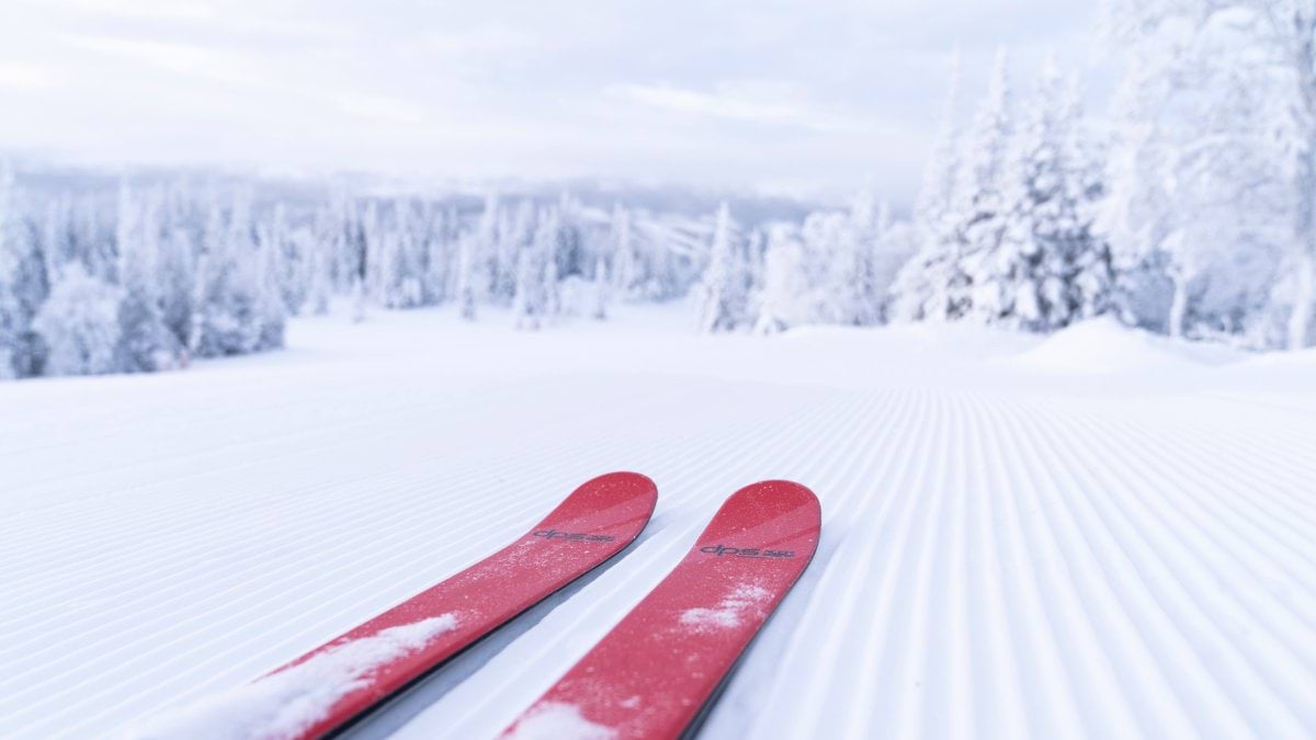 Red skis on a freshly groomed slope in Åre.