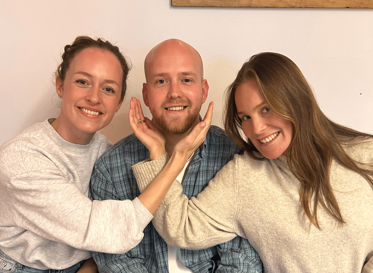 Three people sitting 