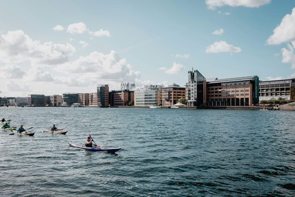 people riding kayak during daytime