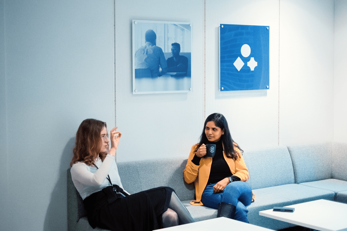 Colleagues in conversation in Grimstad