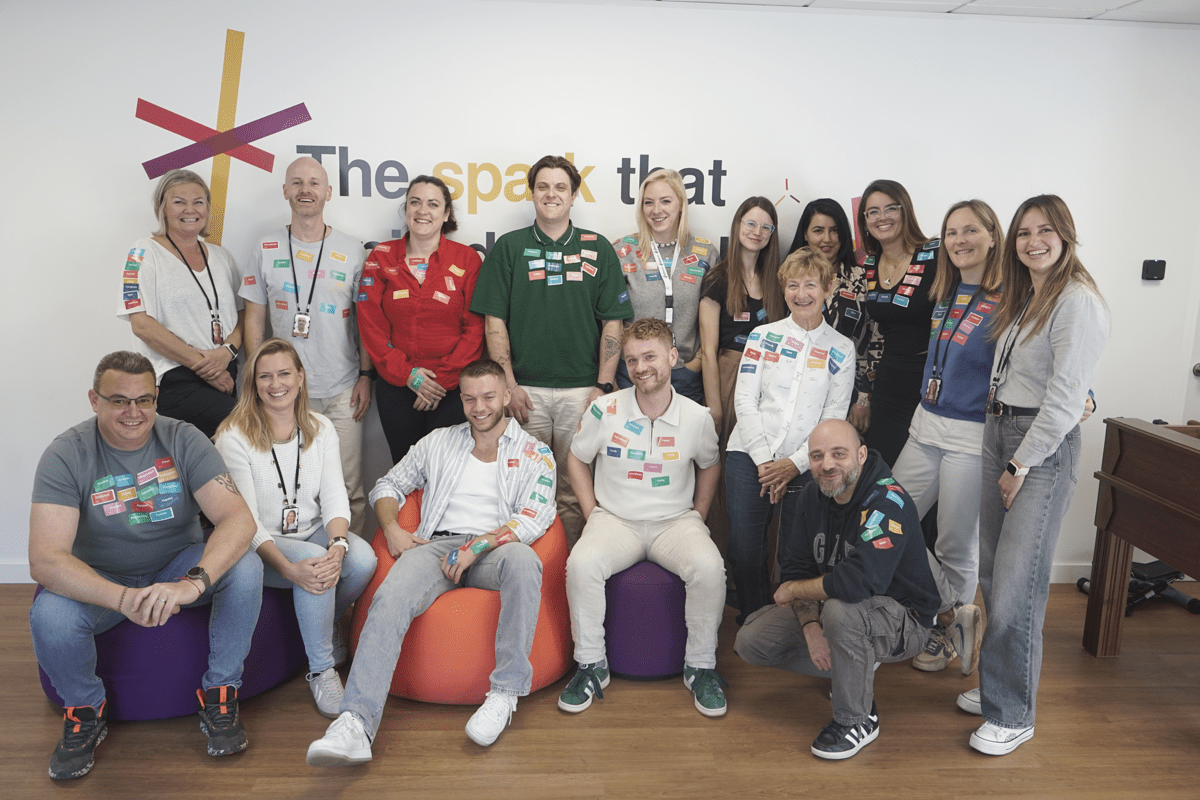 Group of smiling colleagues after training
