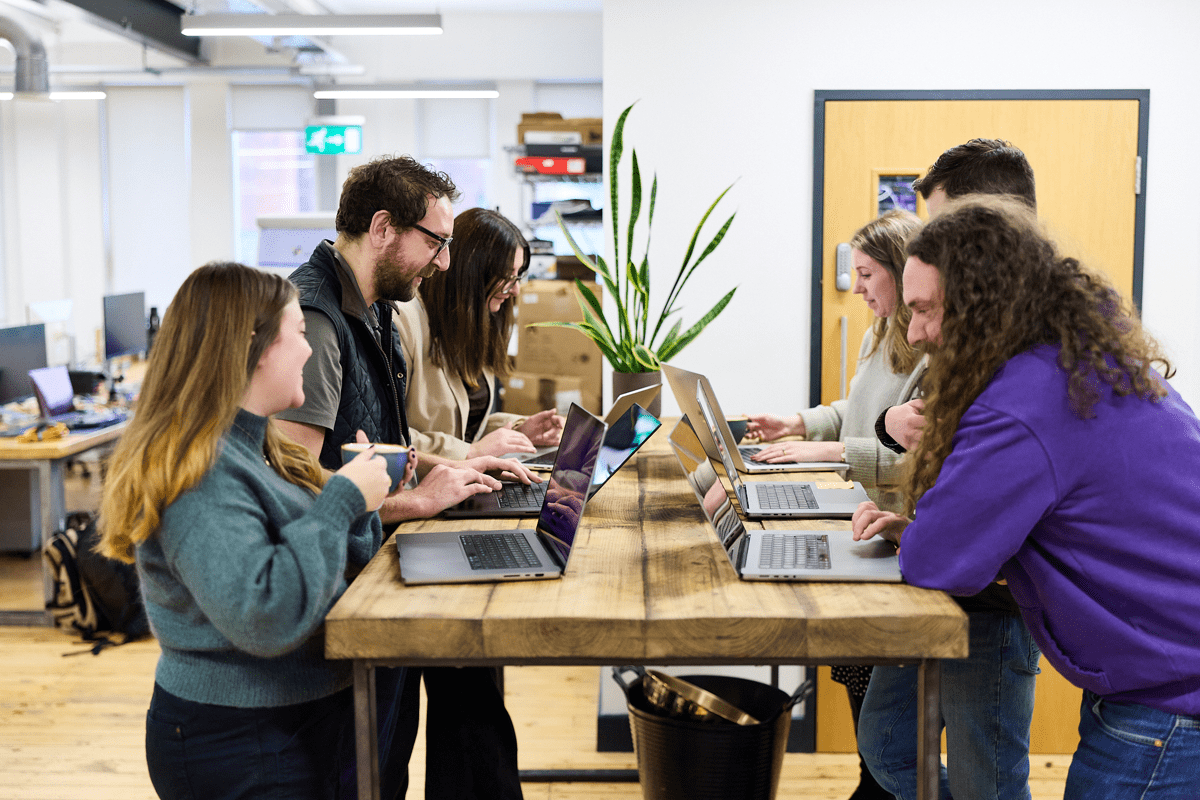 Parallax team collaborating at a desk