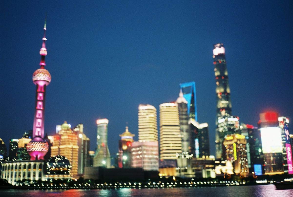 a view of a city at night from across the water