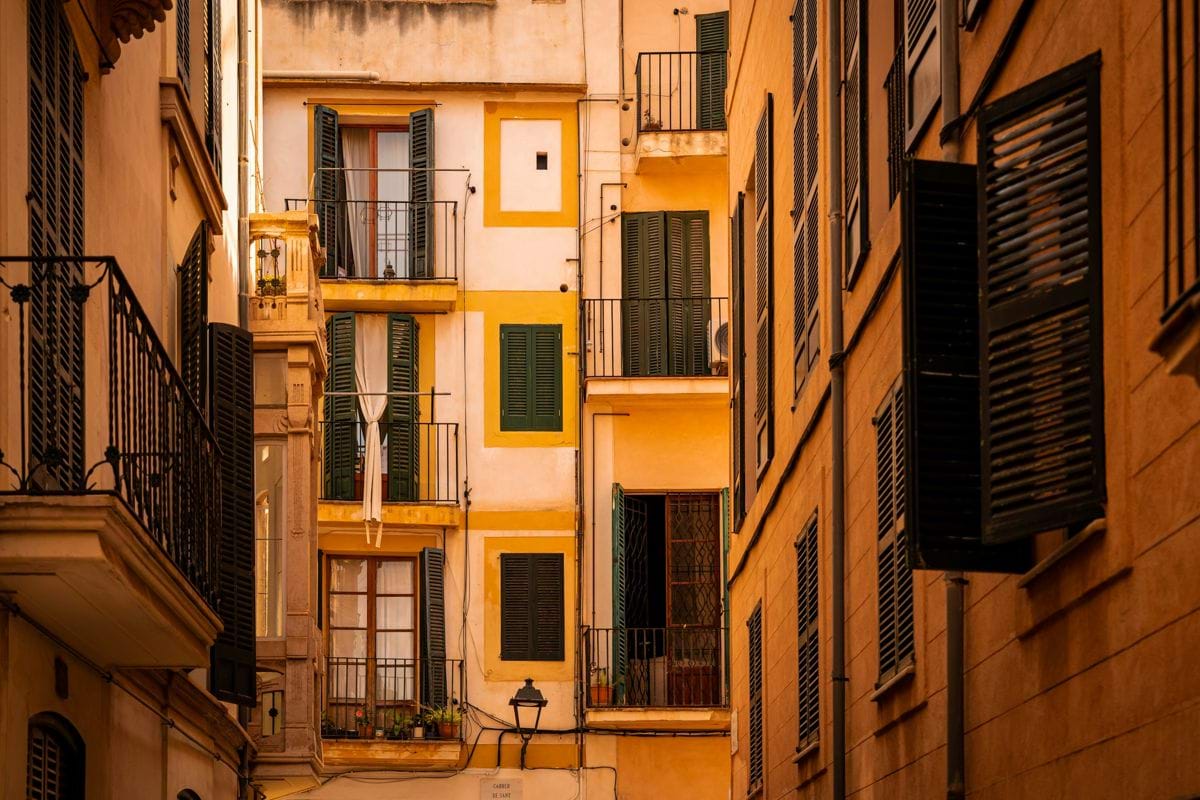 a row of buildings with balconies