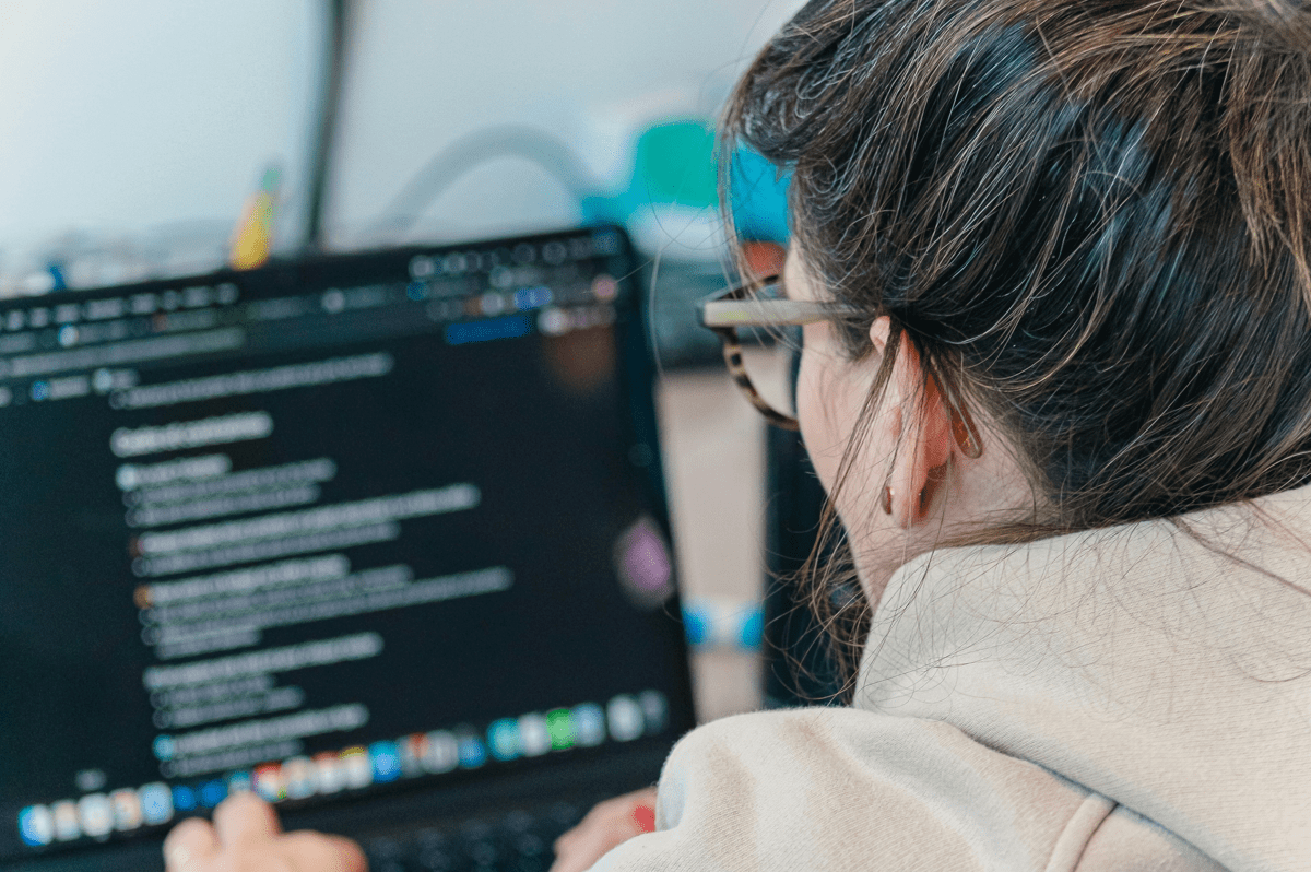 women in front of a laptop