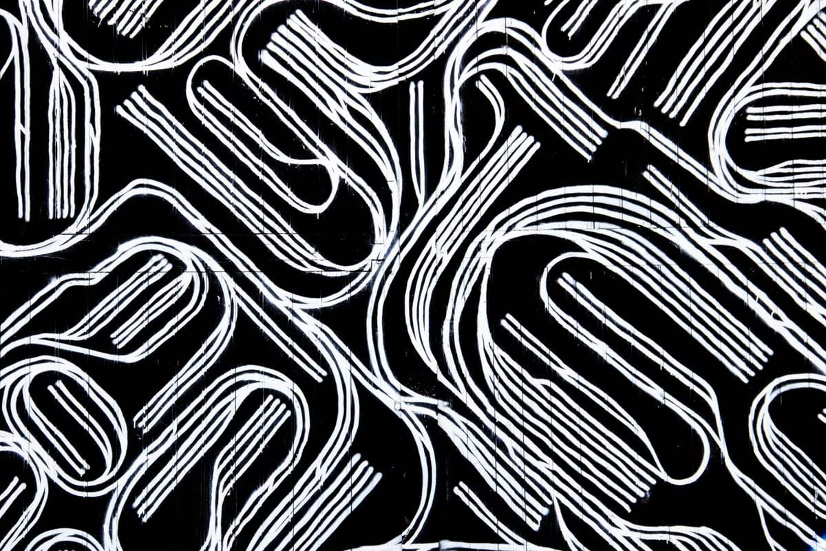 a black and white background with white lines