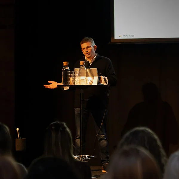 Man speaking on a stage