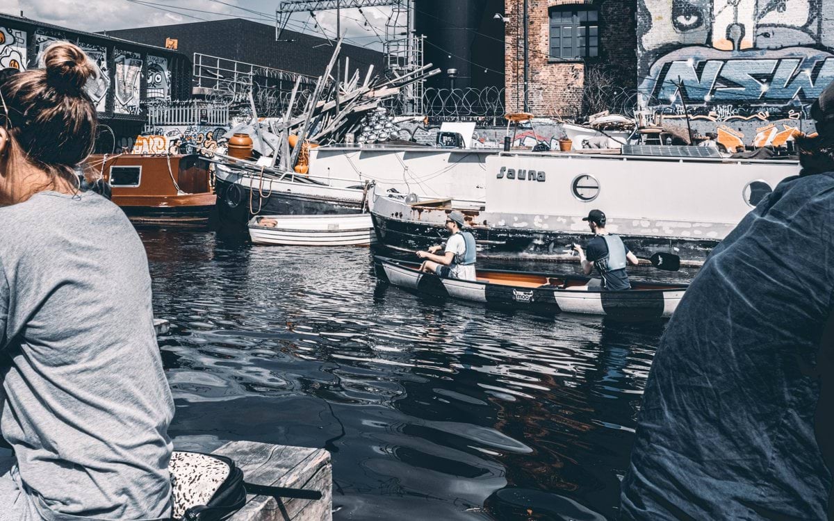 white and brown boat on water during daytime