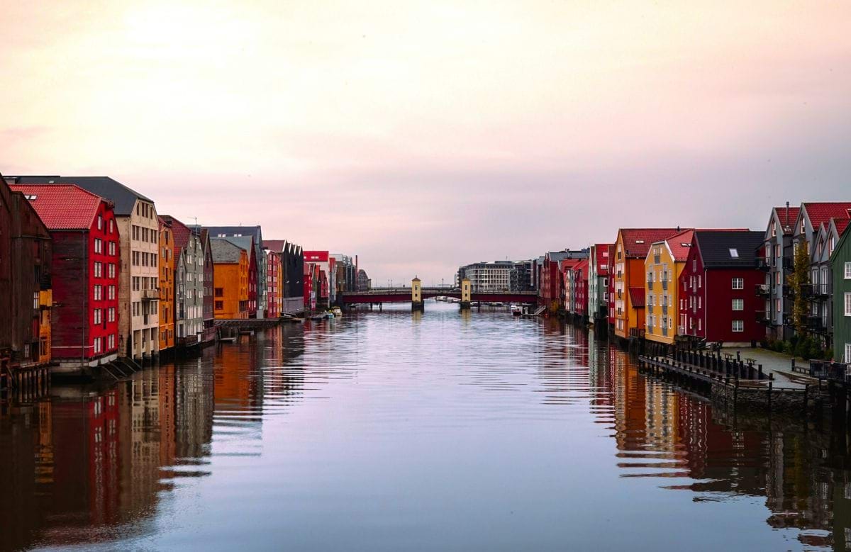 a waterway with houses on both sides of it