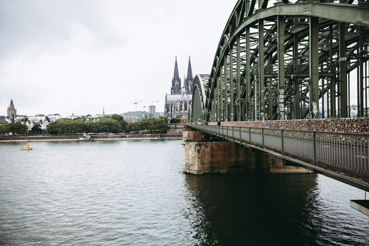 gray metal bridge over river during daytime