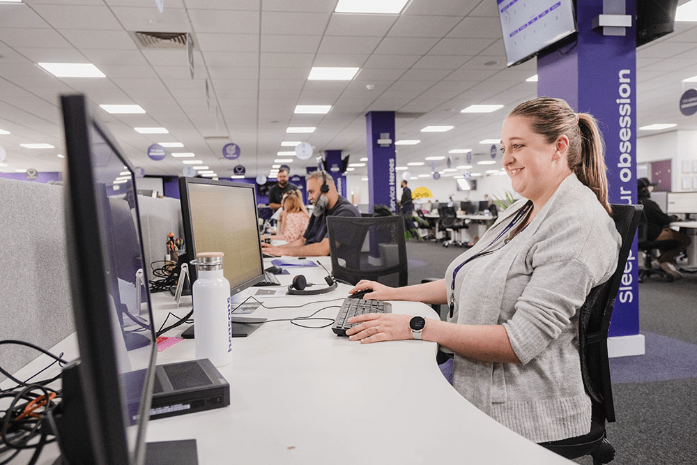 Woman smiling in a call centre