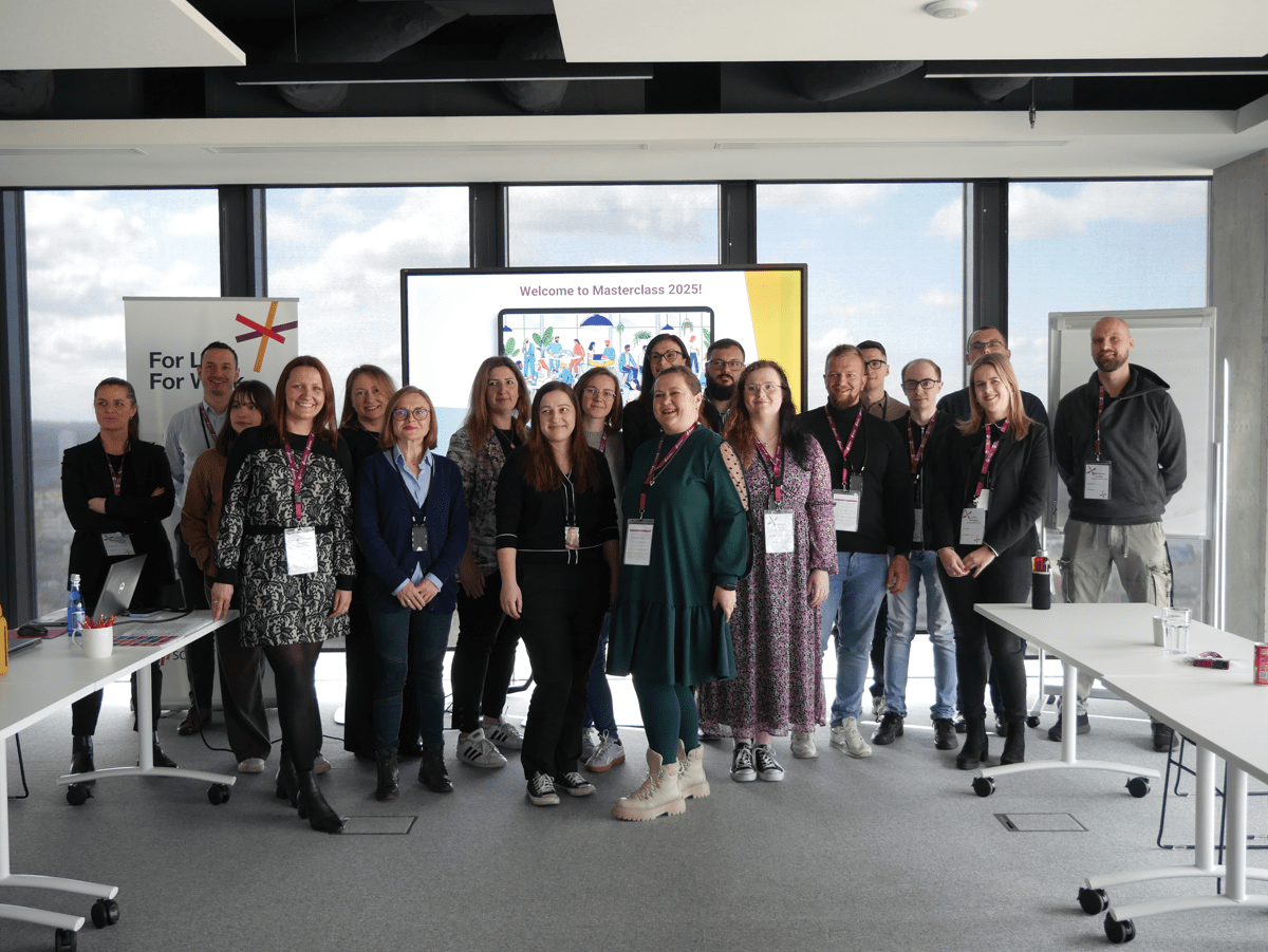 SD Worx team celebrating a project milestone with a group photo