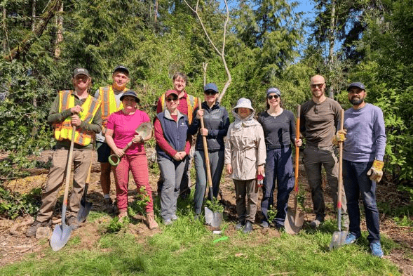 Vancouver Power and Transportation Group planting trees in honor of Earth Day