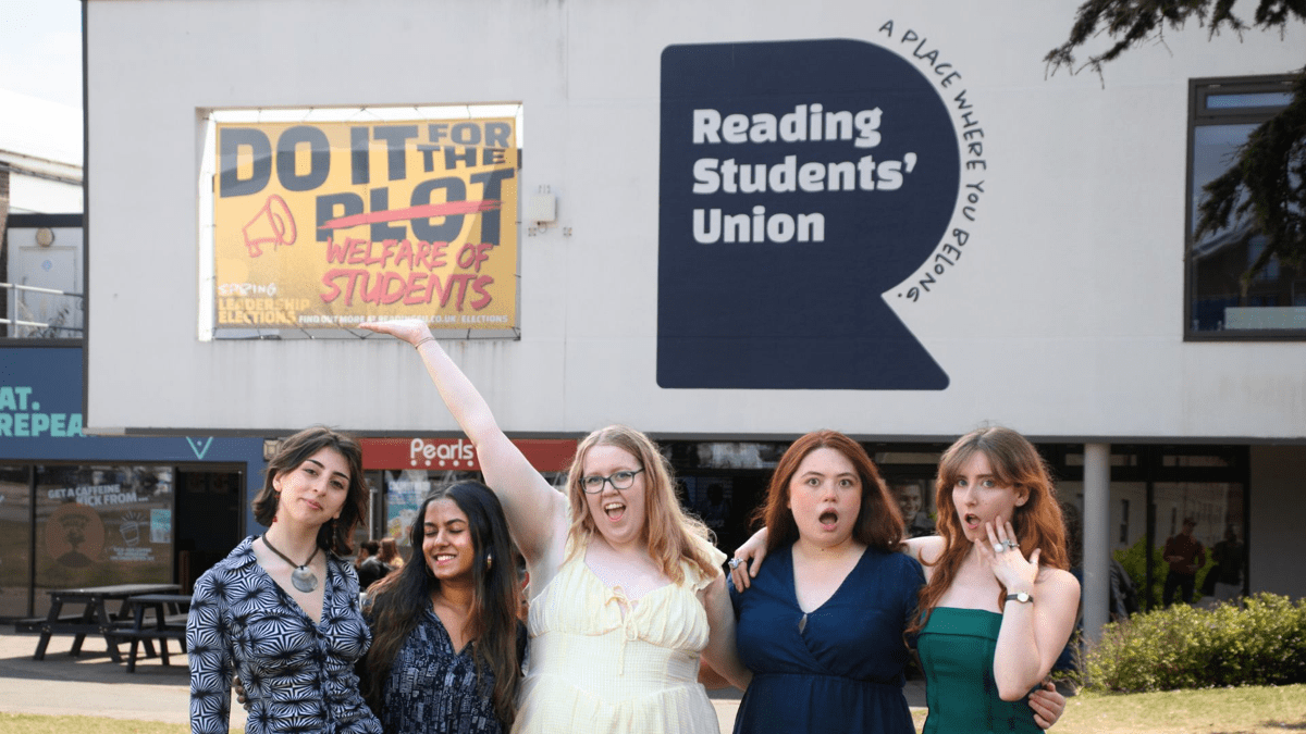 5 female students posing outside the students' union