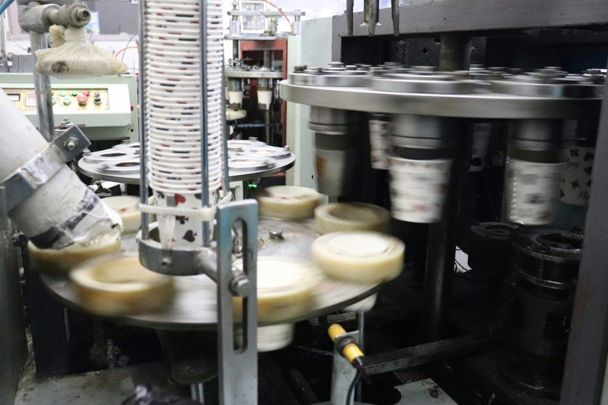 a machine making cheese in a factory