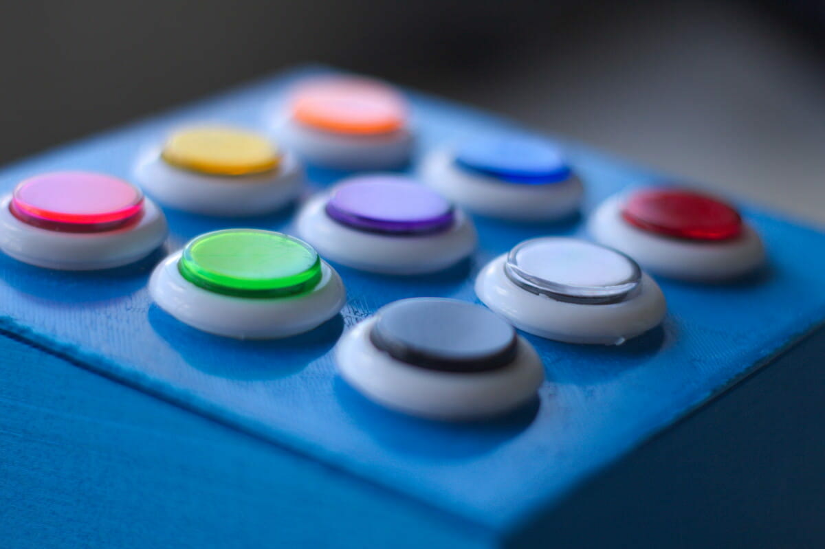 blue white green yellow and red buttons