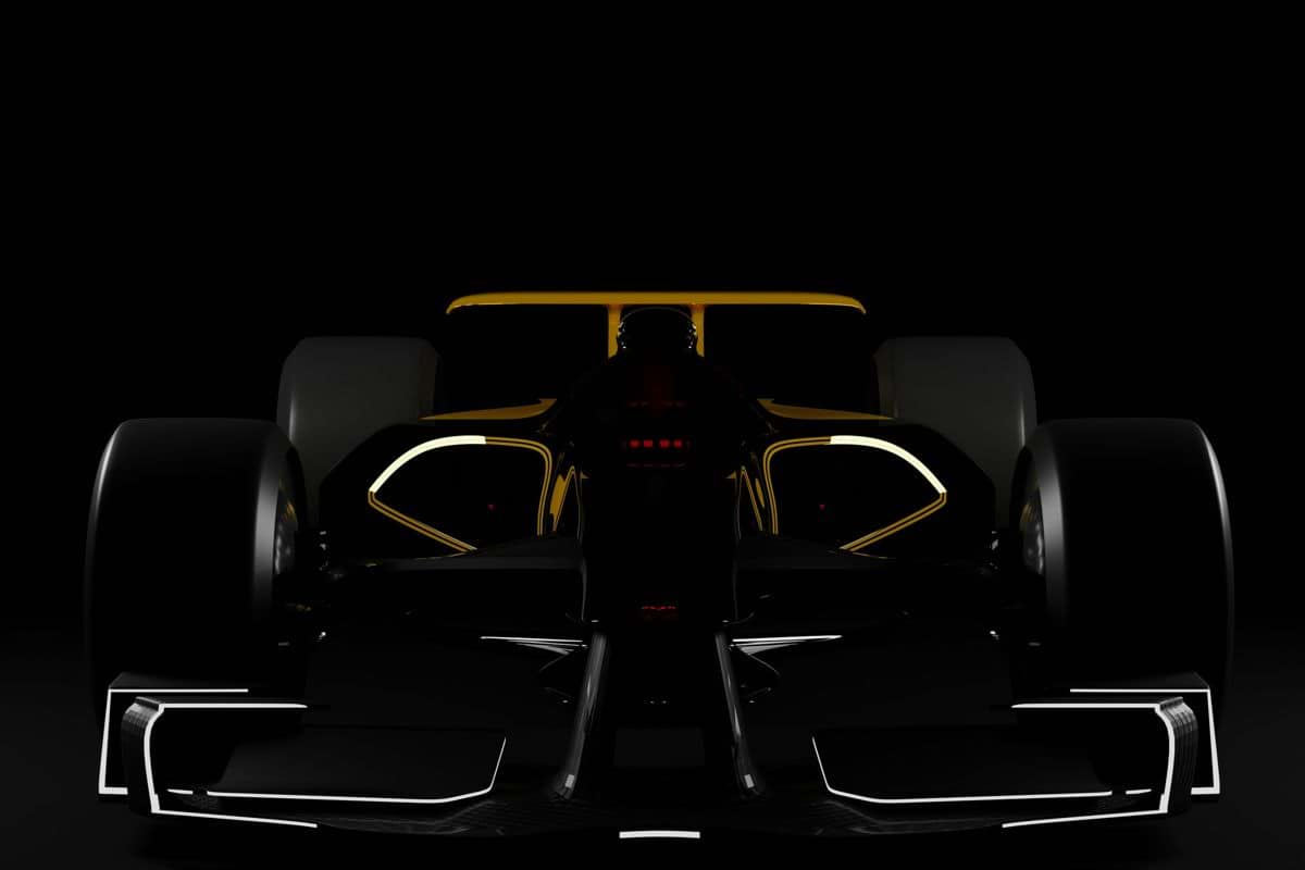 a black and yellow race car in the dark