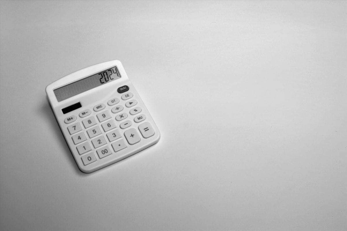 a white calculator sitting on top of a table