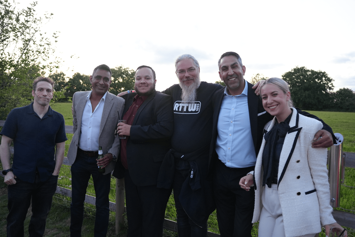 Employees enjoying outdoor summer gathering at Apprentify Group