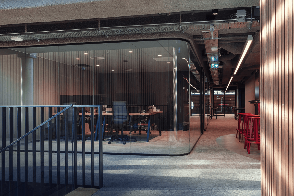 Glass meeting rooms in the GoodHabitz office in Eindhoven