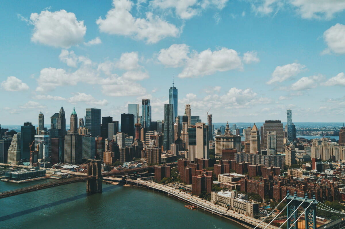 wide angle photo of Brooklyn Bridge under cloudy sky.jpg