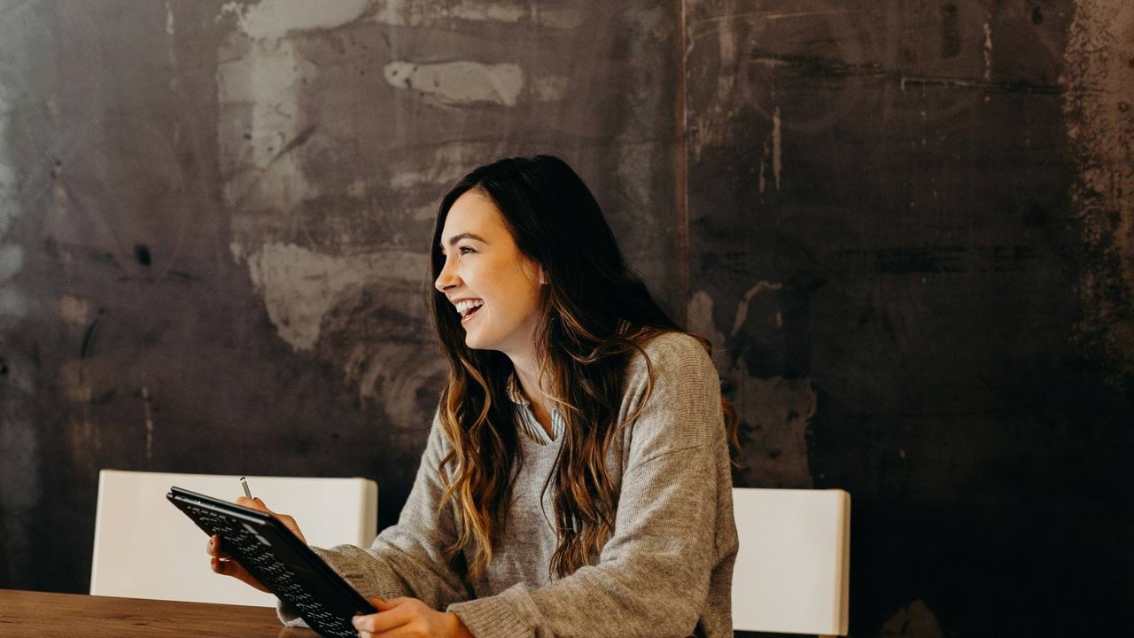 two person smiling during daytime