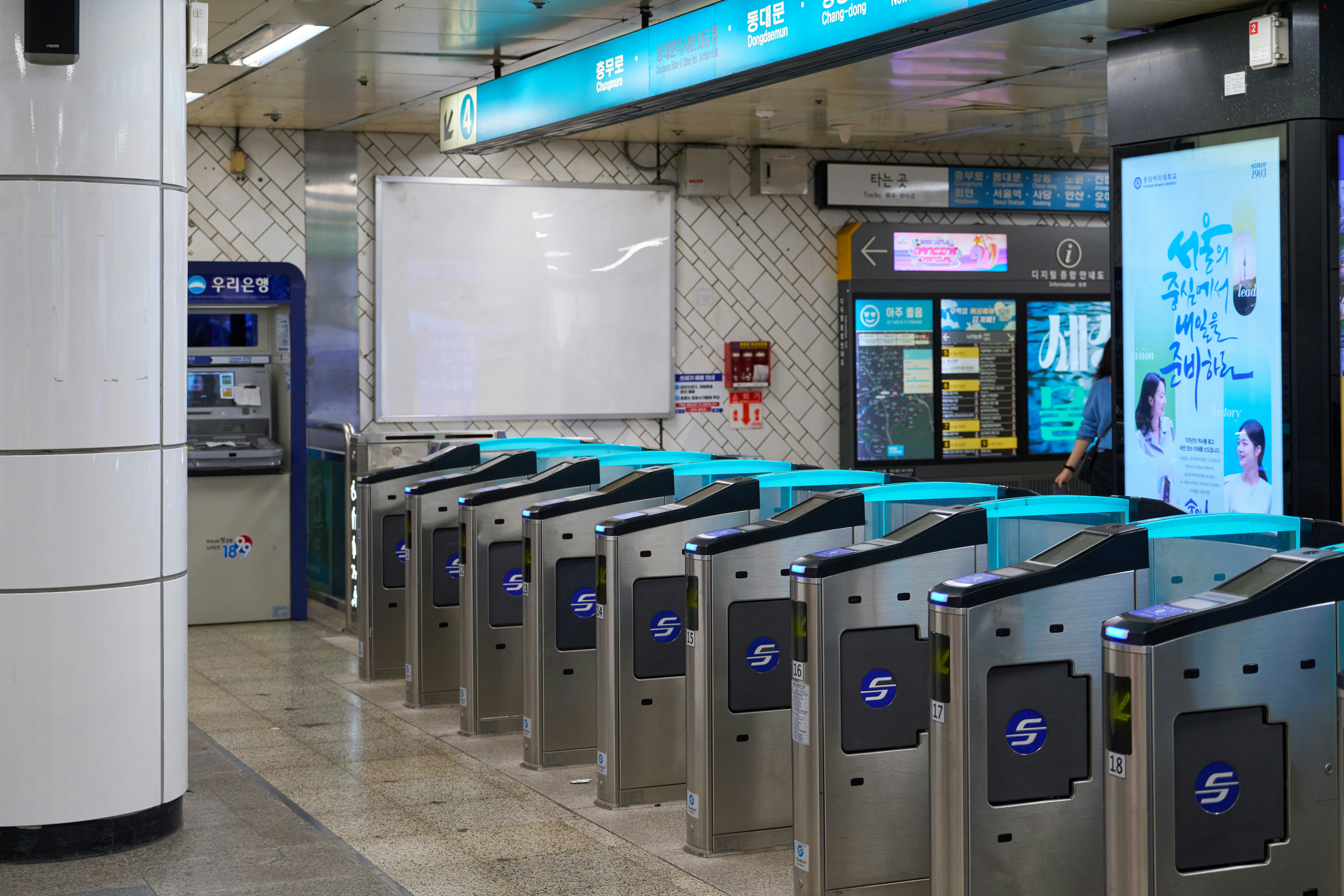 Automated turnstiles in a subway station entrance.