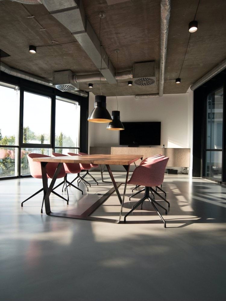 photo of dining table and chairs inside room
