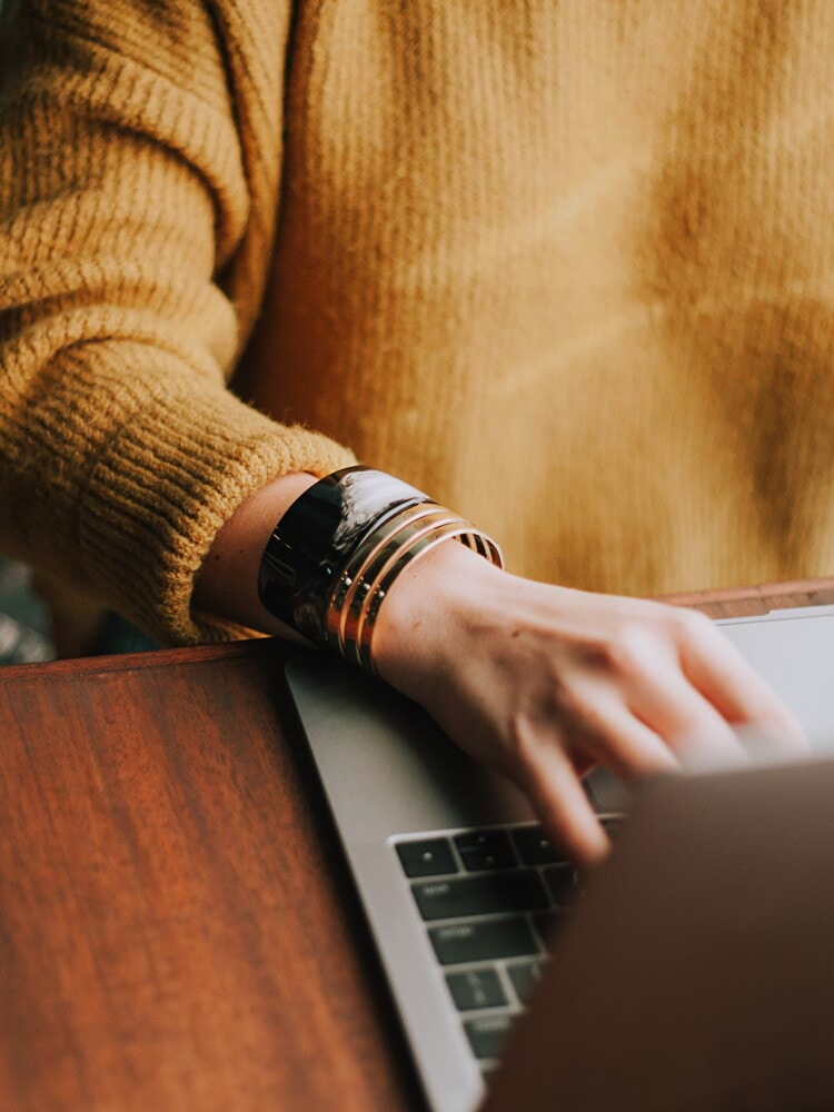 person using laptop computer