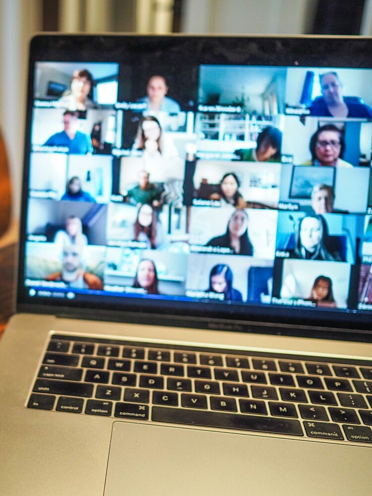 macbook pro displaying group of people