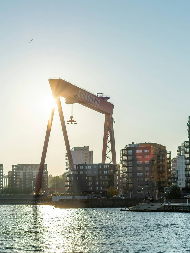 high rise buildings near body of water during daytime