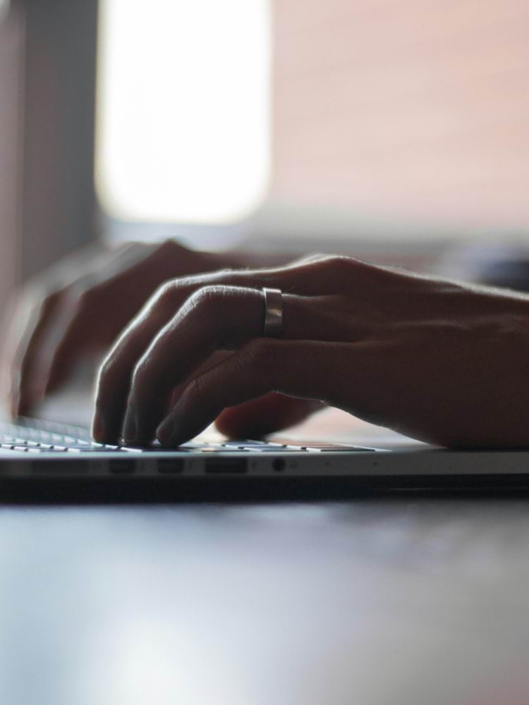 person using laptop