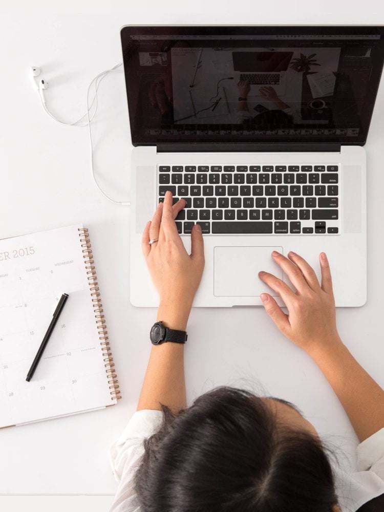 person using MacBook Pro