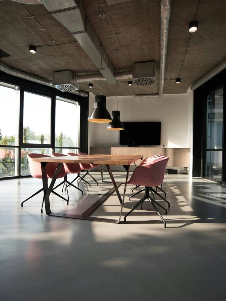 photo of dining table and chairs inside room