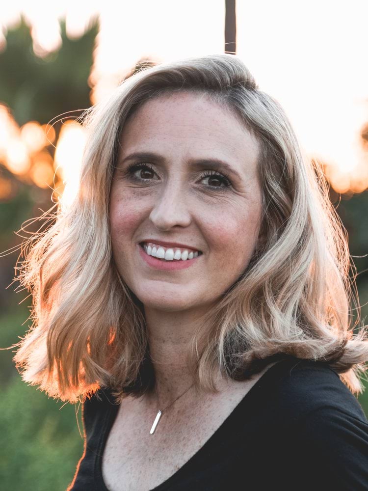 smiling woman in shallow focus photography