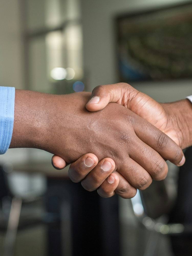 two people shaking hands