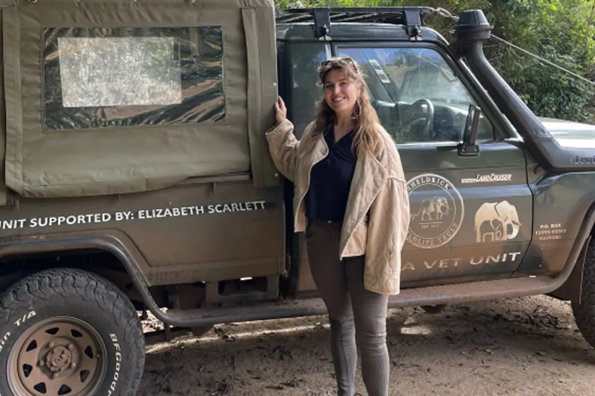 Elizabeth Scarlett team member with conservation vehicle