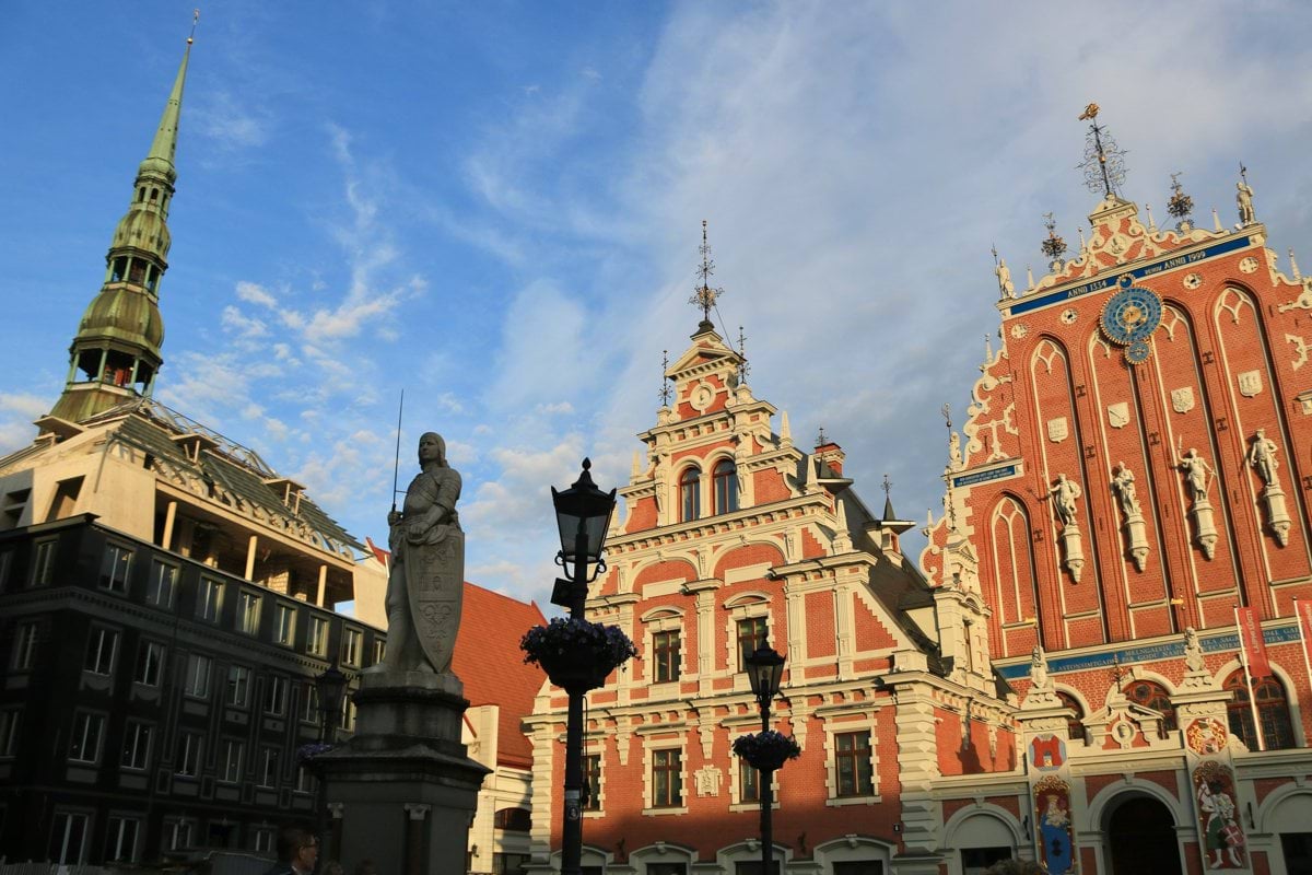 a large building with a clock on the top of it