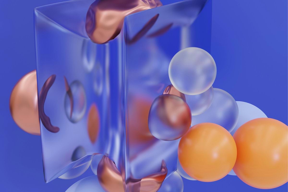 a hand holding a balloon