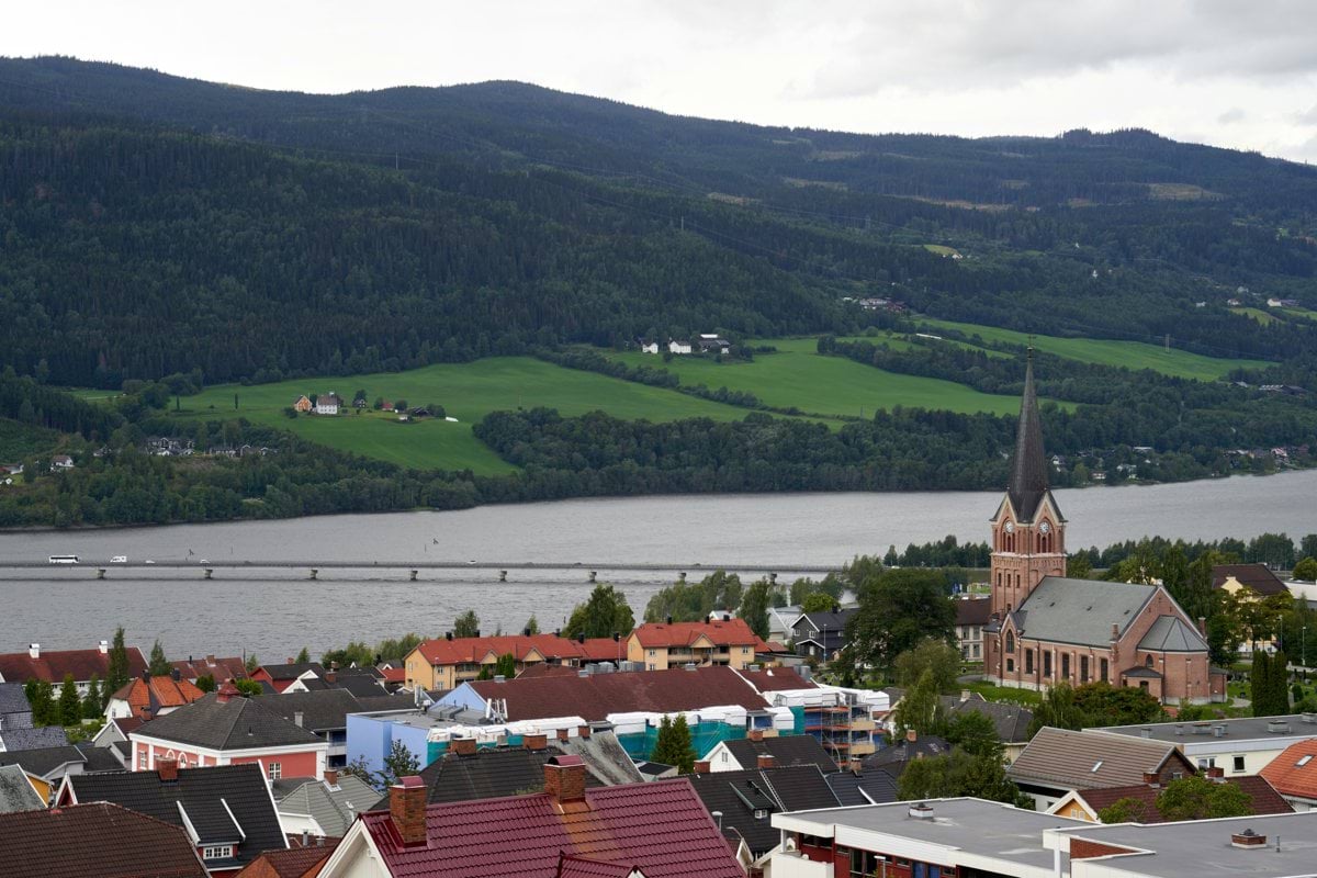 A view of a town with mountains in the background