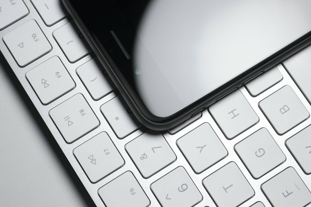 a close up of a computer keyboard with a mouse