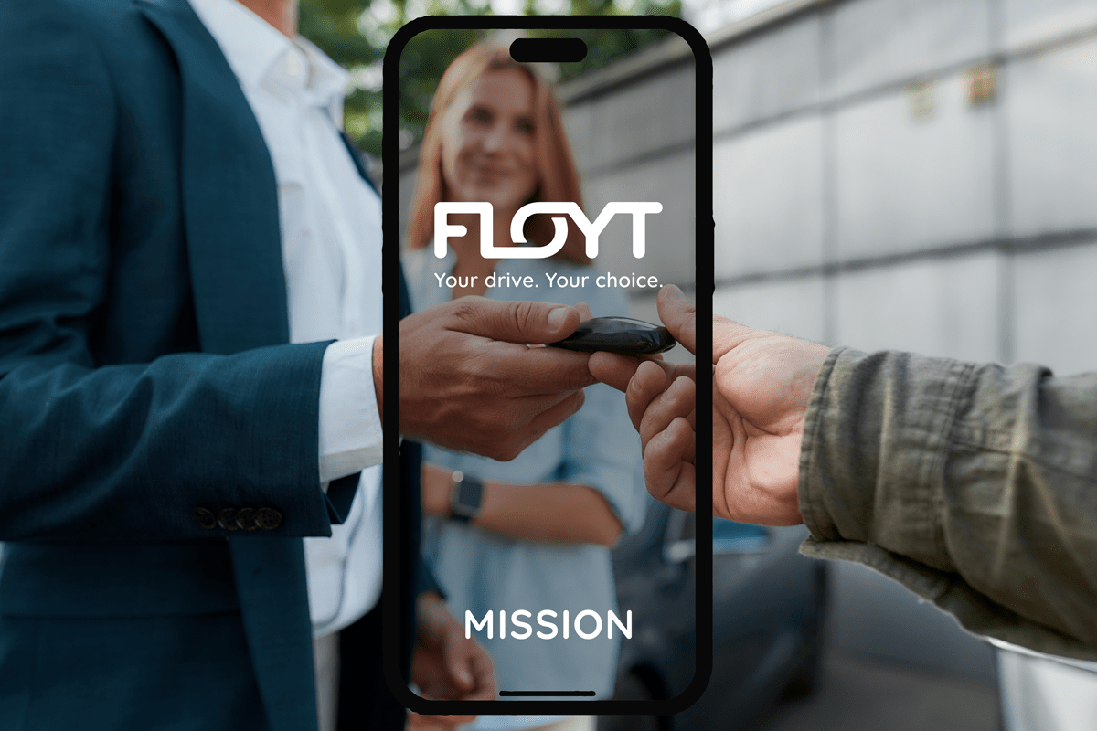 Logo floyt over two hands and a car key