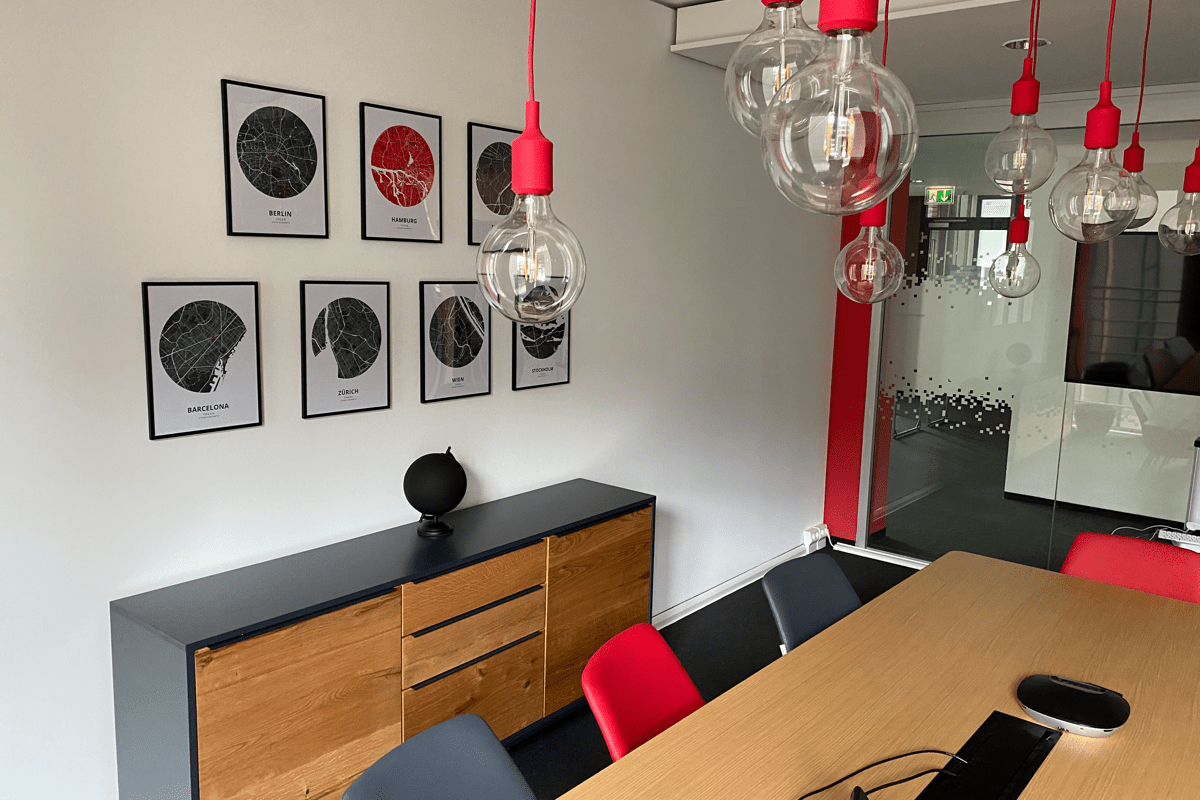 Meeting Room with Pictures on the Wall and a Desk with Chairs