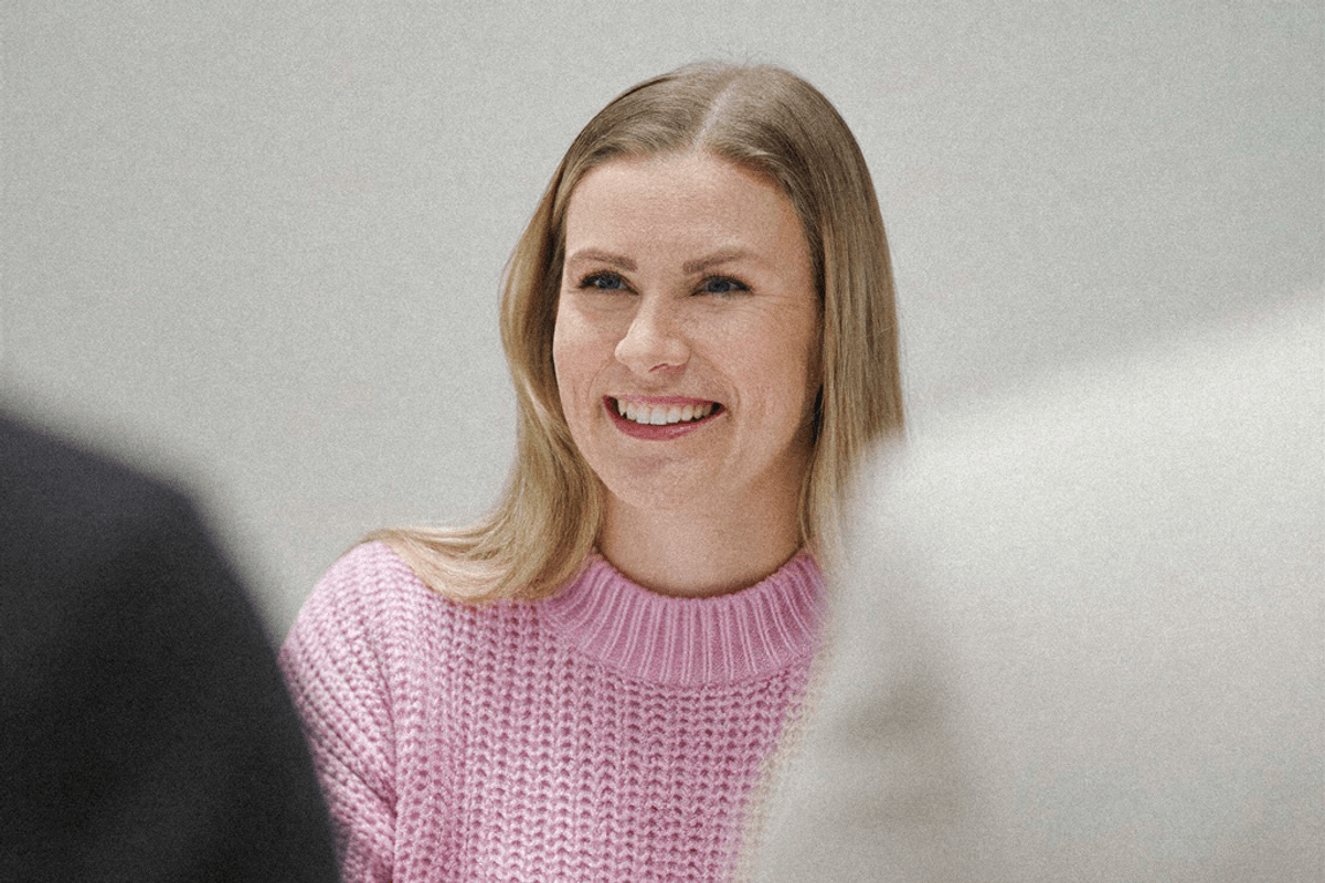 Happy girl in pink sweatshirt