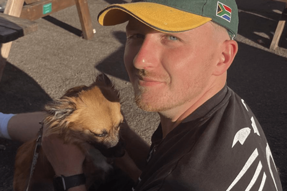A man with a dog