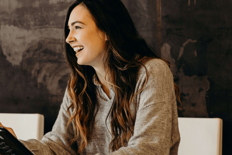 A woman working in mental health and social care recruitment for a blog about understanding and hiring for the supported living sector